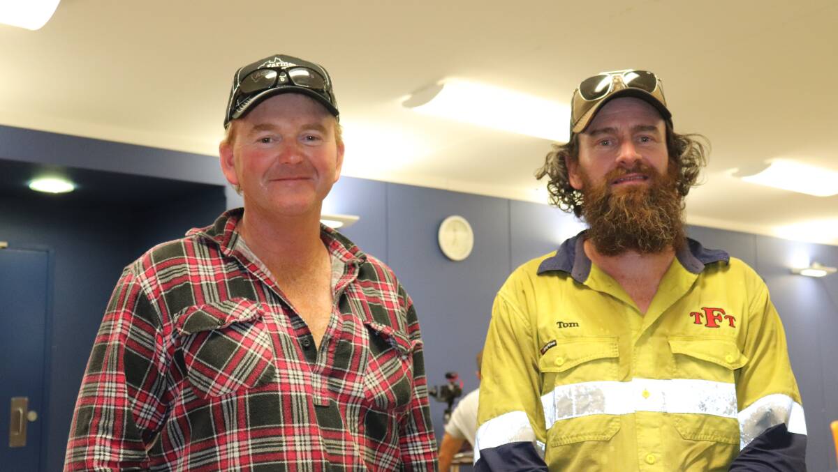 On the arrival at Leonora were hay run drivers Tim Scott (left), Coomalbidgup and Tom Fullerton, Cunderdin.