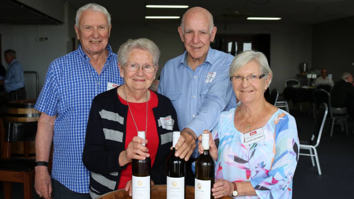 EPEA chairman Garry Dunstan (left), Hillarys, presented a bottle of wine each to these three lucky door prize winners Bev and Ross Blechynden, Albany and Lorraine Symington, Willetton.