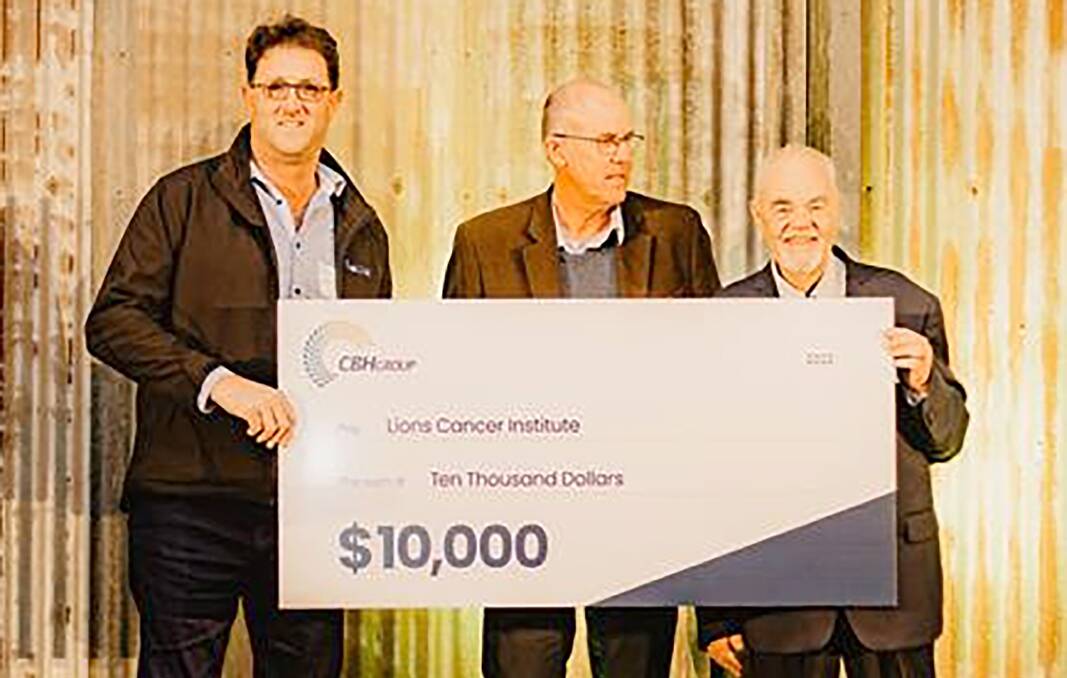 Cunderdin grower Norm Jenzen (left), CBH chairman Simon Stead and Lions Cancer Institute bard member Neil Saunders with a cheque for $10,000 at the Northam Regional Member Forum last Thursday.