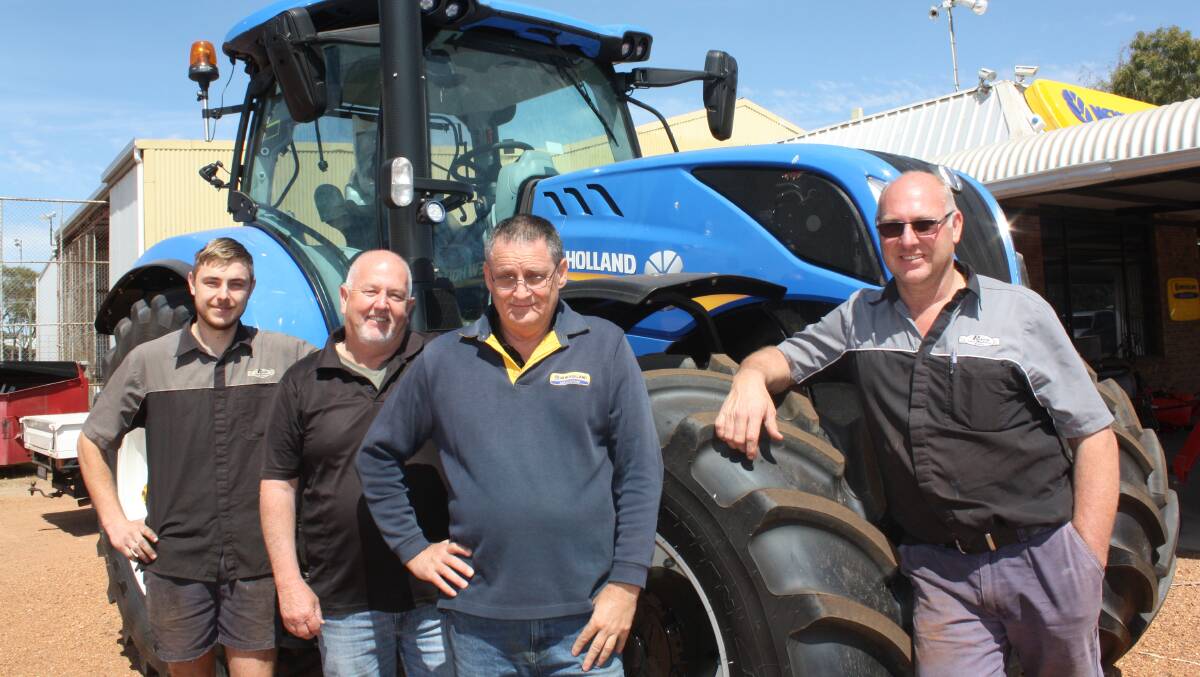 Staff at Perkins Farm Machinery Centre, Northam, are predictably flat out as the hay season gathers pace. But Torque timed a visit to perfection last week taking this snap before farm visits started. From left, third year apprentice Mark Love, branch manager Peter Morton, parts manager Paul Harris and service technician Brian Davis.