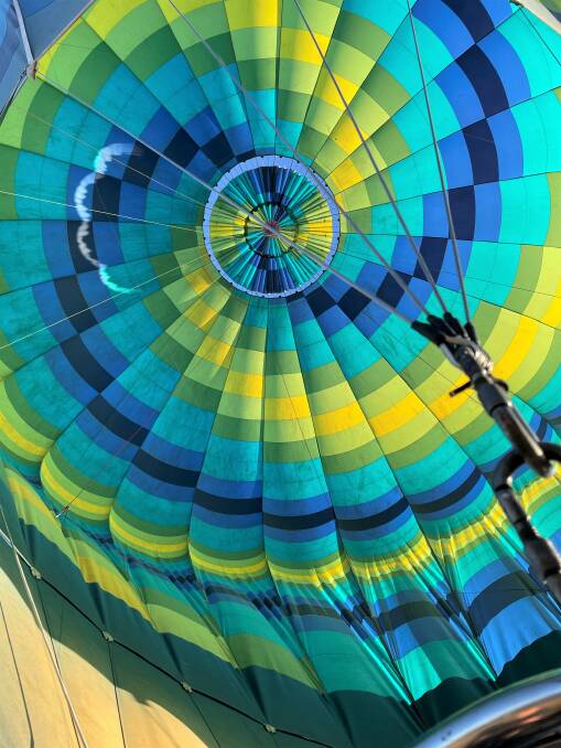 Looking up, inside the balloon with the gas burners going.