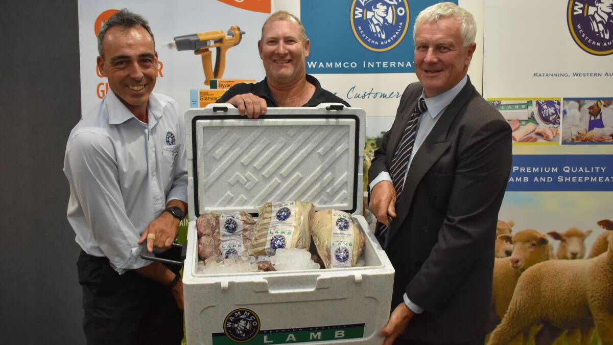 With a WAMMCO meat esky that was given to the top three placegetters in each category were WAMMCO supply and development manager Rob Davidson (left), Adrian Squiers,
CJ Squiers & Sons, Quairading and WAMMCO chairman Craig Heggaton. Mr Squiers went home with an esky after his family's operation finished third in the large crossbred supplier section.