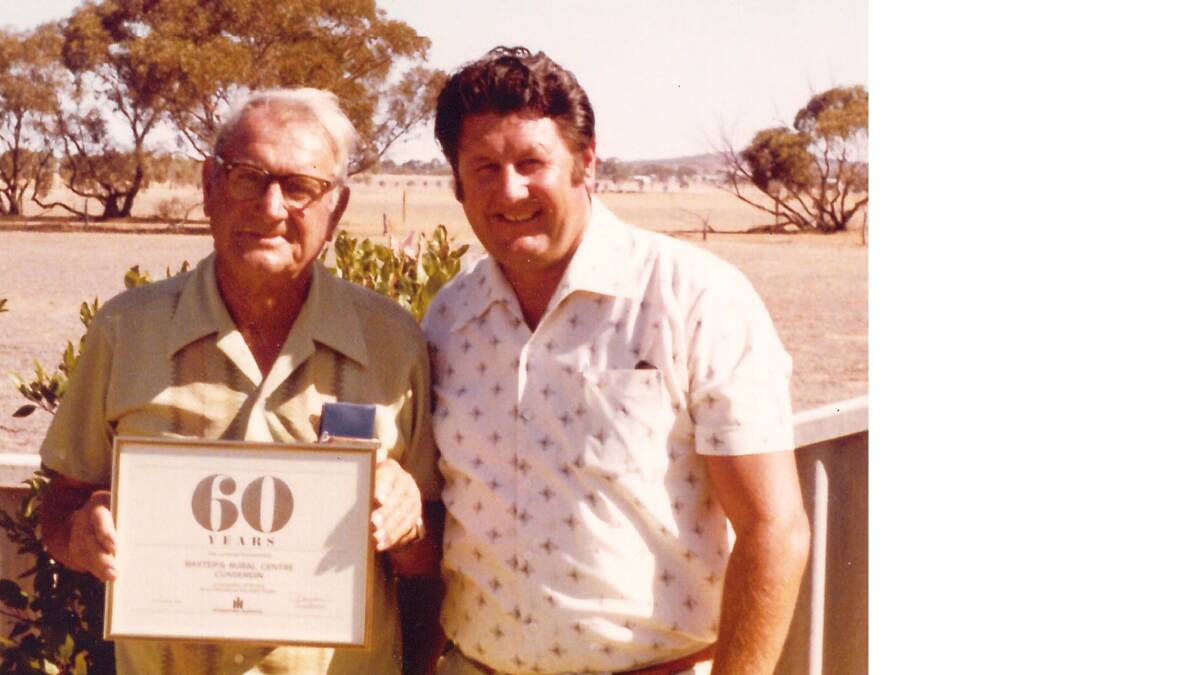 Kenneth William (Bill) Baxter (left) with his son Ken pictured in 1979 celebrating 60 years as International Harvester dealers selling trucks and tractors.