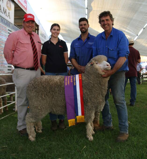 With the grand champion Poll Merino ewe and champion medium wool Poll Merino ewe exhibited by the Wise familys Wililoo stud, Woodanilling, were sponsors Tim Spicer (left), Elders stud stock and Kyah Peeti, Farm Weekly and Wililoo stud principals Rick and Clinton Wise.