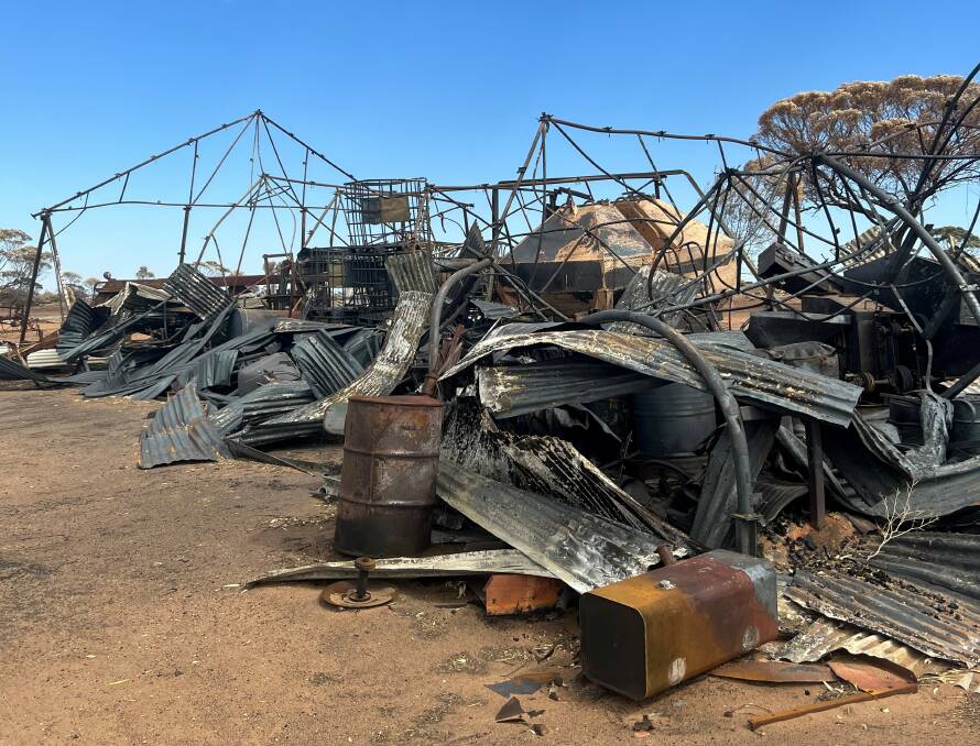 Claypans machinery sheds lie in a twisted ruin after last years fires around Corrigin.