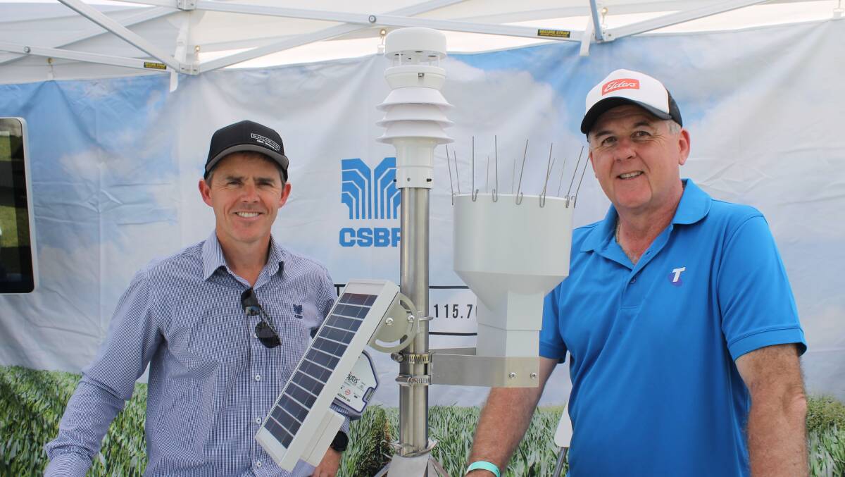 CSBP's Justin Mercy (left) and Telstra's regional general manager Boyd Brown discuss Telstra's Internet of Things technology at the recent Dowerin GWN7 Machinery Field Days.