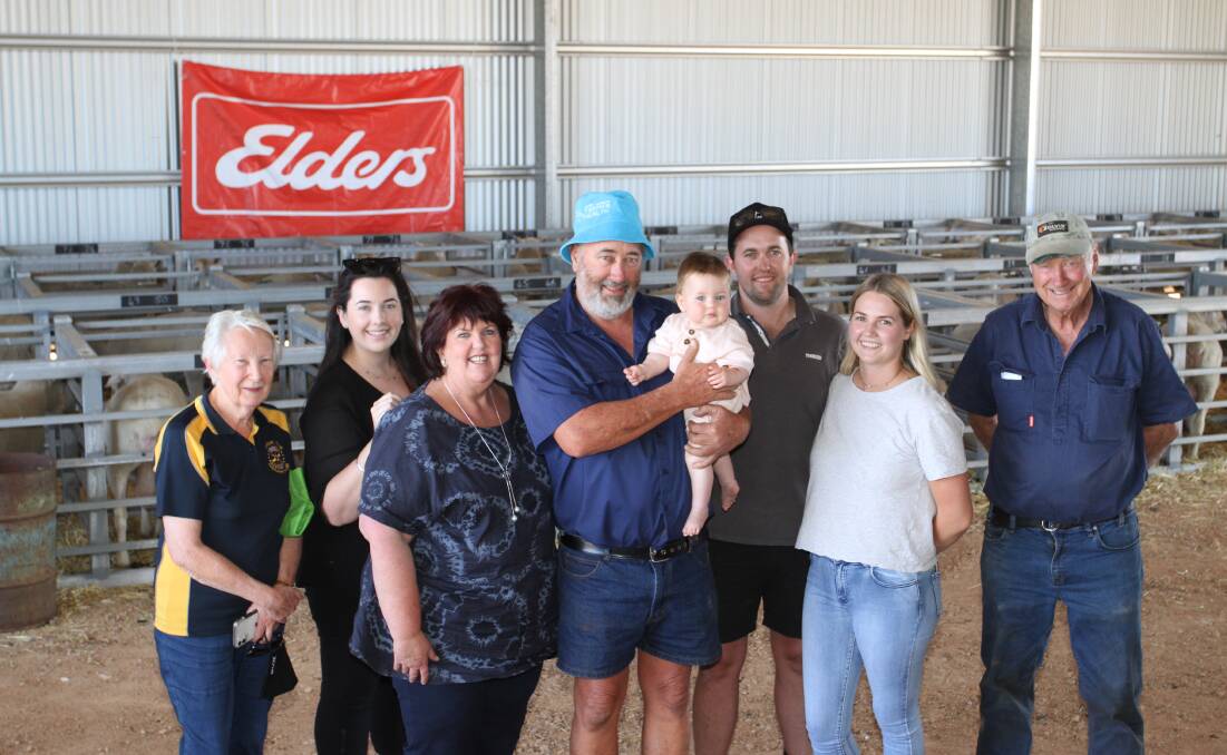 Four generations of the Patmore family Maxine (left), Lauren, Robin, Chris, holding granddaughter Isabel, Ashley and Richelle Patmore, Riverbend Poll Dorset and Border Leicesters studs, Eneabba, with original 20-year client Brian White, Whites (Barara) Pty Ltd, South Eneabba, at the 20th anniversary Riverbend on-property ram and ewe sale last week.