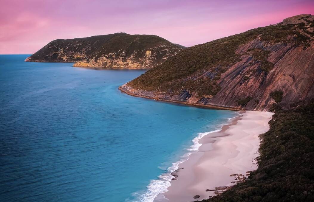 Judge Brad Farmer described Misery Beach as "uncrowded, crystal-white sand, turquoise waters and a very dramatic granite backdrop". Photo: Drew Aris, At Altitude Photography