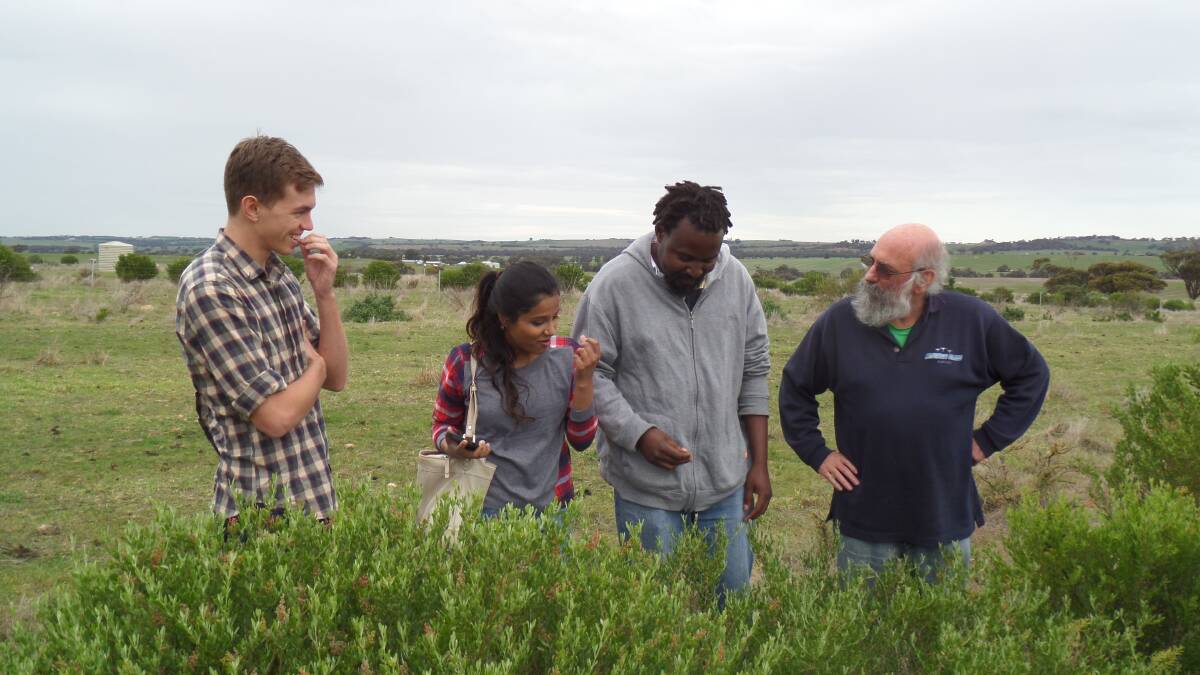 Professor Graeme Martin discusses native shrubs with students at UWA Farm Ridgefield.