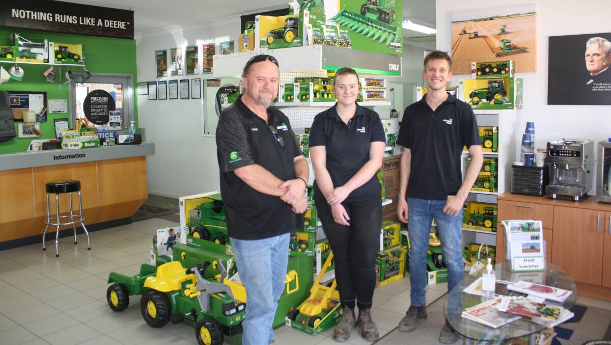With apologies to Michael Buble, it's beginning to feel a lot like Christmas with toys in every machinery dealership store. And as Torque discovered last week, AFGRI Equipment's Wongan Hills branch has gone to great lengths to remind customers about Santa's 'green treasures'. Pictured here (left), are parts manager Lance Eastwood and parts interpreters Madeleine Burt and Tanner Driscoll.