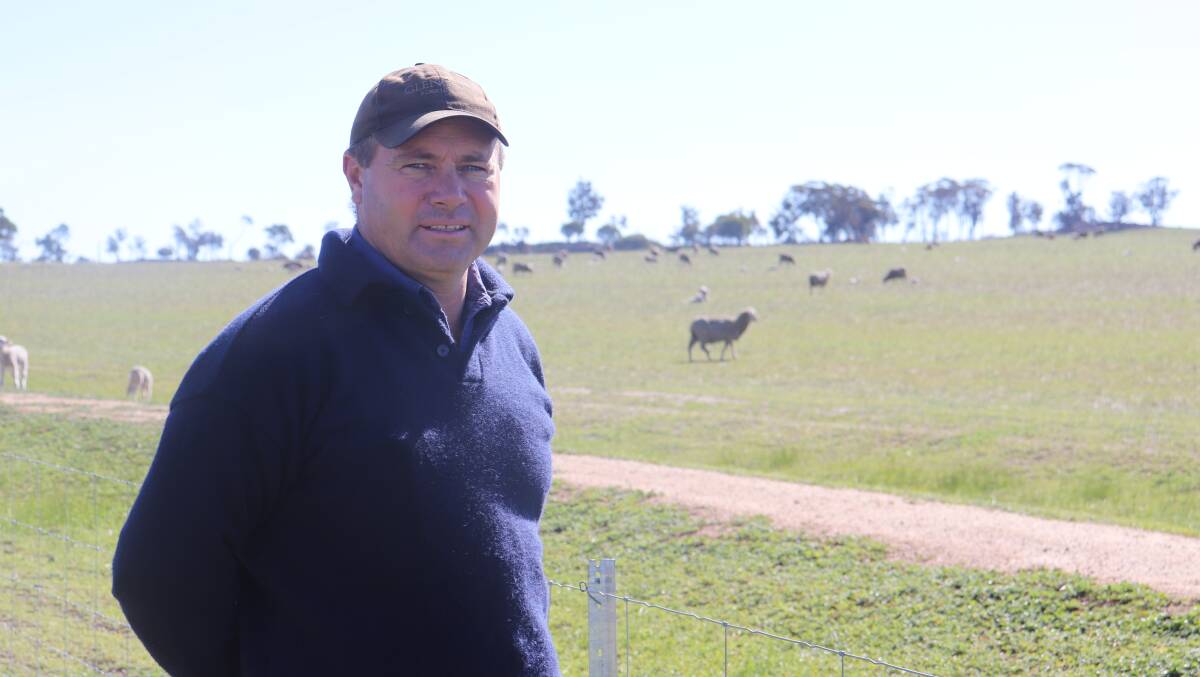  Wagin farmer Cam Clifton with some of his ewes and lambs that were mated to and sired by a ram that participated in the 2018 drop for the Yardstick Merino Sire Evaluation at the Katanning Research Facility. The Clifton's are excited about their results which show they are on track to meet their breeding objectives.