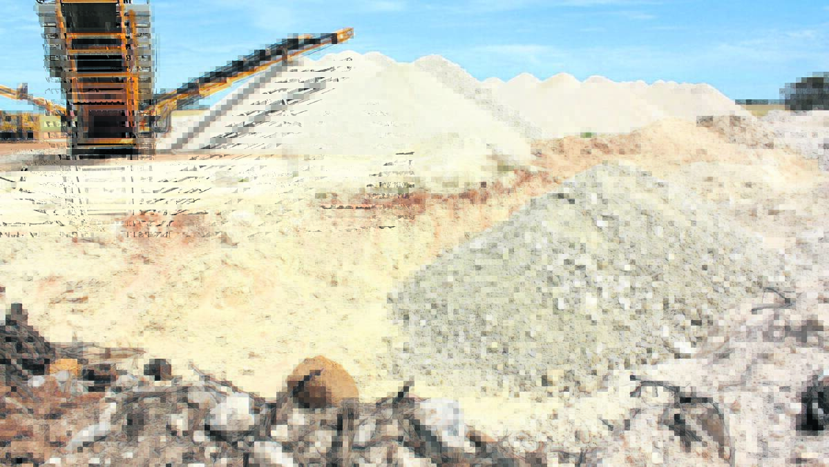 The traditional way of creating a lime pit (left) using an excavator and dozer, stands in stark contrast to reefinated land (right) from which limestone can be collected by a scraper and screened.