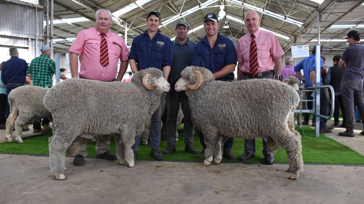 With the $8750 top-priced and $8000 second top-priced Barloo Merino rams were Elders stud stock representative Kevin Broad (left), Barloo's Fraser House, buyer of both rams Daniel Patterson, Redwood Enterprises, Gnowangerup, Barloo's Timm House and Elders Gnowangerup agent Richard Poulish.