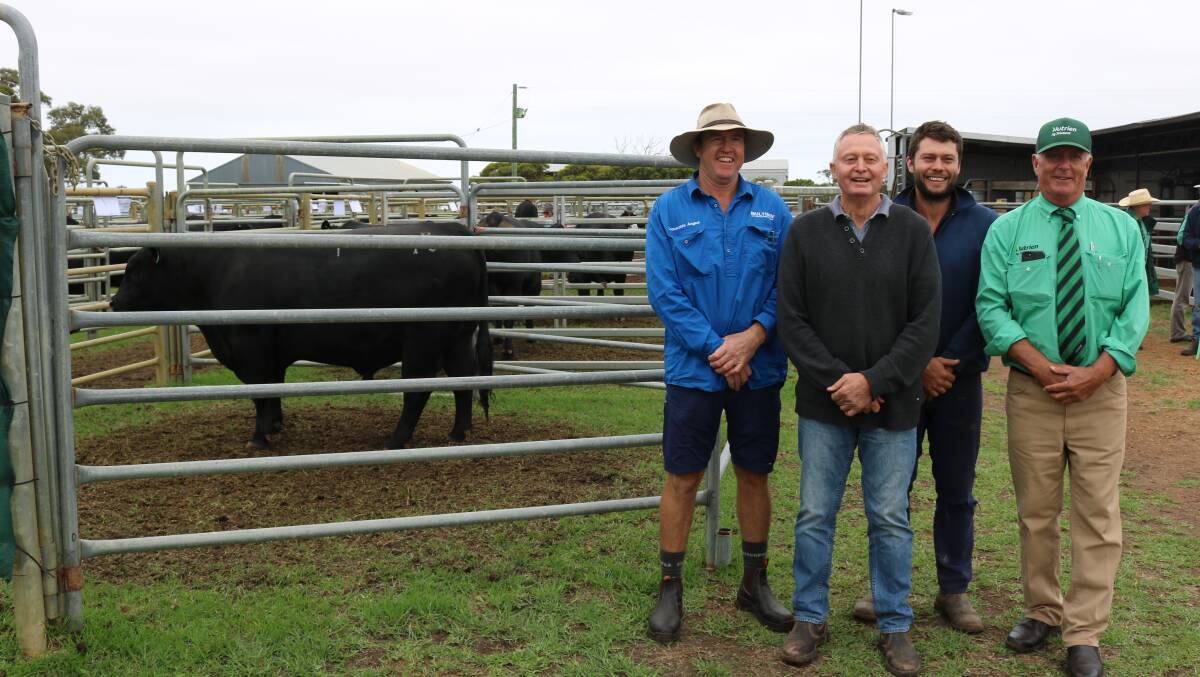  In front of the pen with one of the equal $23,000 second-top priced bulls of the day were Coonamble stud co-principal Craig Davis (left), buyers Noel and Luke Bairstow, Arizona Farms, Lake Grace and Landmark Southern livestock manager Bob Pumphrey.