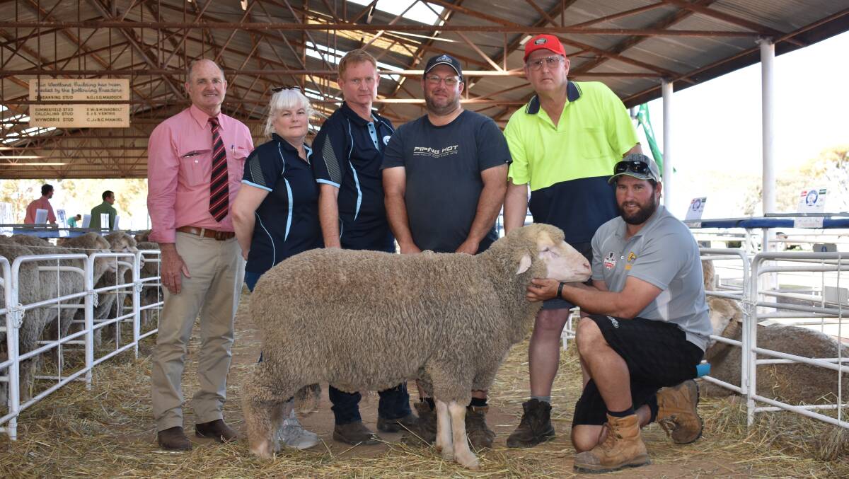With the $2700 top-priced sire at last week's Calcaling ram sale at Mukinbudin were Elders Merredin branch manager Andrew Peters (left), Calcaling stud principals Sandie and Athol Ventris and buyers Michael, Victor and Robert Lee, East Pingelly and Bullaring.
