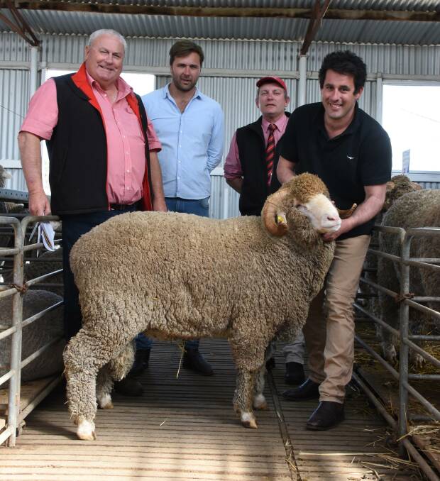 Prices hit a high of $5000 in the Merino side of the catalogue at last weeks Woolkabin on-property ram sale at Woodanilling. With the top-priced Merino ram were Elders stud stock representative and Woolkabin classer Kevin Broad (left), who purchased the ram for an undisclosed Wheatbelt stud, Woolkabins Tom Patterson, Elders, Katanning branch manager Keith Daddo and Woolkabins Ben Patterson.