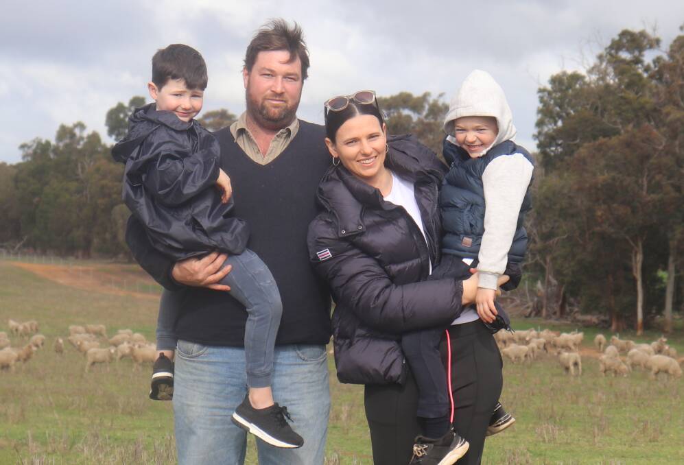 Murray (left) and Rosalind Saunders with children Verne and Lawson. The family's farming operation covers 2000 hectares at Narrogin.