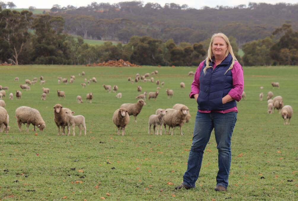 Stephanie with some of their ewes and lambs. The family has 1800 hectares and runs a flock of 1500 Dohne breeding ewes and 500 ewe hoggets.