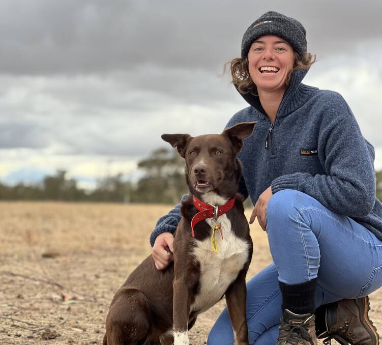 Mandy Matthews and her sheepdog Rua, Mandy is wearing some of the MKM originals, New Zealand-made workwear she sells.