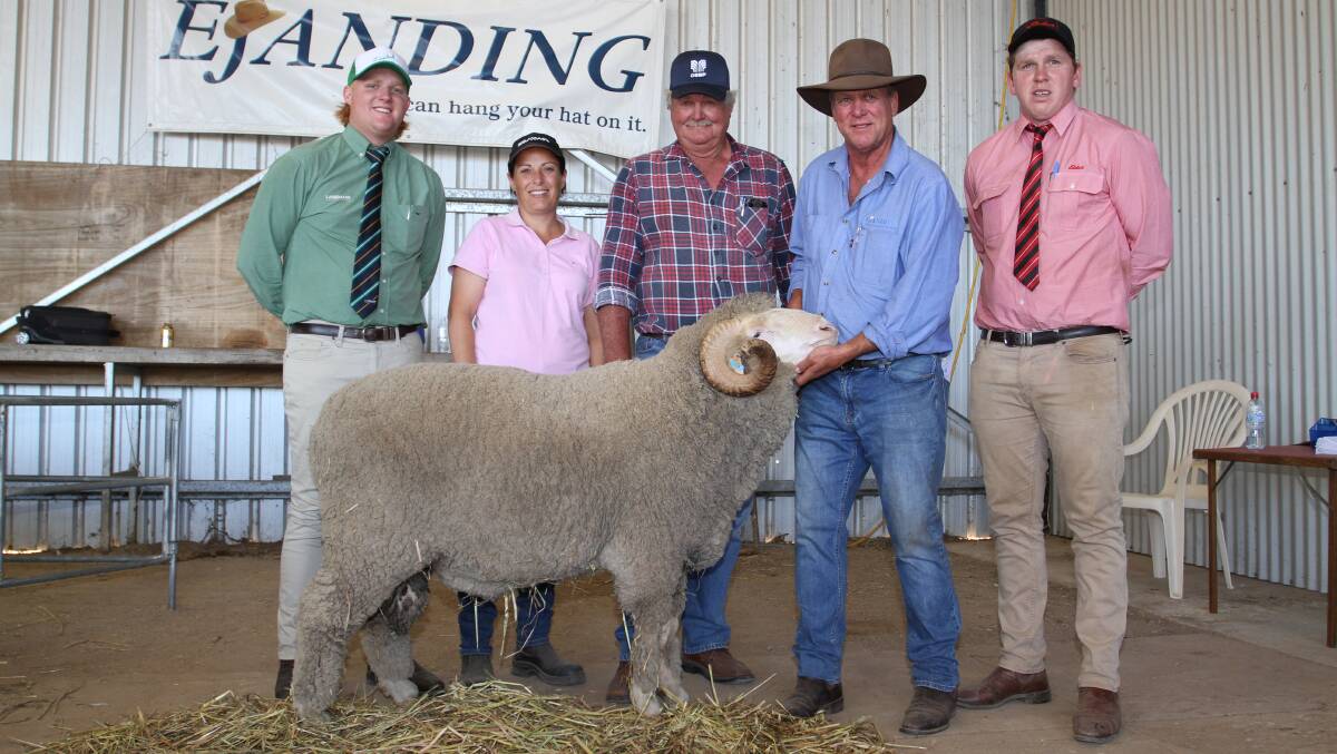 Merino ram values topped at $2800 for the sale team leader at the Ejanding ram sale. With the ram were Livestock & Land trainee Jake Finlayson (left), Landmark Kellerberrin/Cunderdin, buyers and long-time Ejanding clients Holly Bride and her father-in-law Ian Kerr, IA & CA Kerr, Coorow, Ejanding stud principal Brett Jones and Elders stud stock trainee Callum O'Neill.