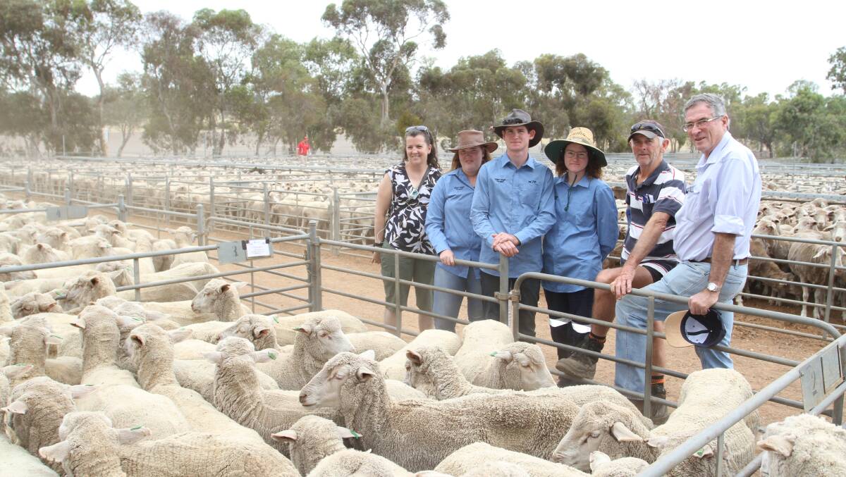 The complete flock dispersal of C Payne & Co, Hyden, was held at AWN Livestock's first ever special sheep sale at Wickepin last Friday. With the dispersal's $191 top-priced line of 568 October-November shorn Kolindale blood 1.5-year-old ewes were Wanda (left) and Andrea Mattingly, Sean Sandercock, Cheyenne Clark and Neil Cummings, C Payne & Co and AWN WA rural property manager Rob McMillan.