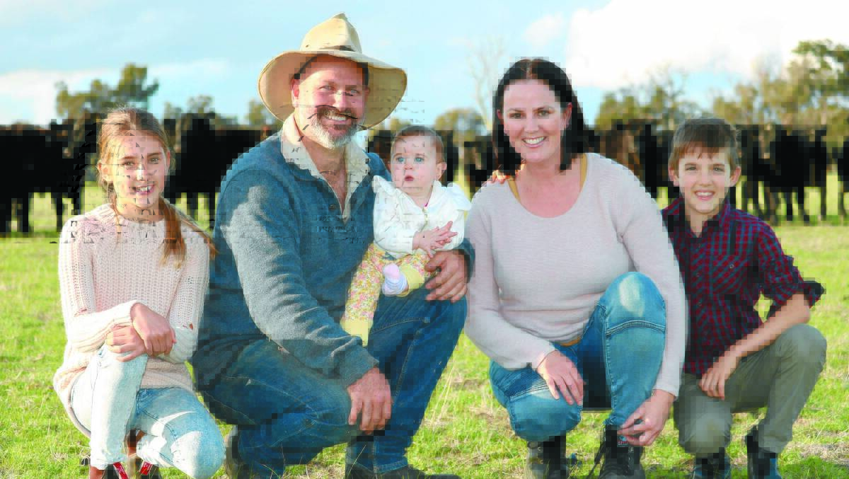 Owen McLarty with partner Michelle and children Jordan, 11, Chace, 9, and Eden, 9 months, at their Pinjarra property.