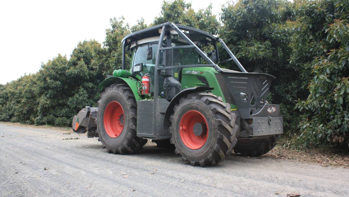 The Fendt Vario 822 tractor sporting a custom-built outer frame to protect the tractor from large diameter branches during pruning operations.