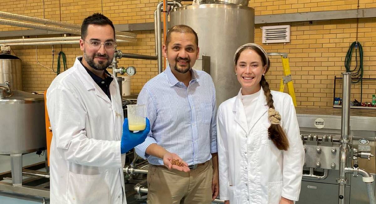  Food Innovation Precinct Western Australia general manager Chris Vas (centre), joined Nick Stamatiou and Nadia Coetzee from Whole to test the suitability of the Whole WINX cell bursting technology to produce a high protein fluid concentrate following the creation of a memorandum of understanding for a plant protein production trial.