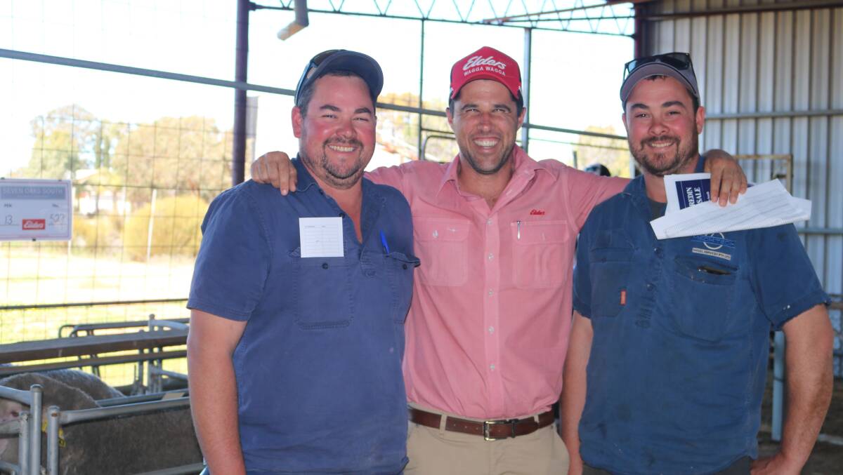 Burracoppin farmers and brothers Shaun Crees, (left) and Brendan Crees (right), Dulebanyundy Farm, caught up with Elders territory sales manager Mitch Clarke before the Merredin Breeders sale commenced.