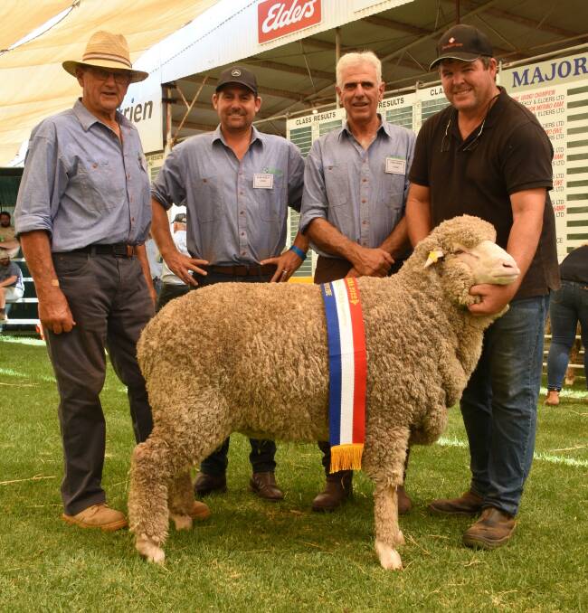  With the champion two-tooth ewe shown by the Rangview stud, Darkan, were judges Rod Norrish (left), Kojonup, Allan Hobley, Nyabing, Chris Hogg, Williams and Rangeview co-principal Jeremy King.