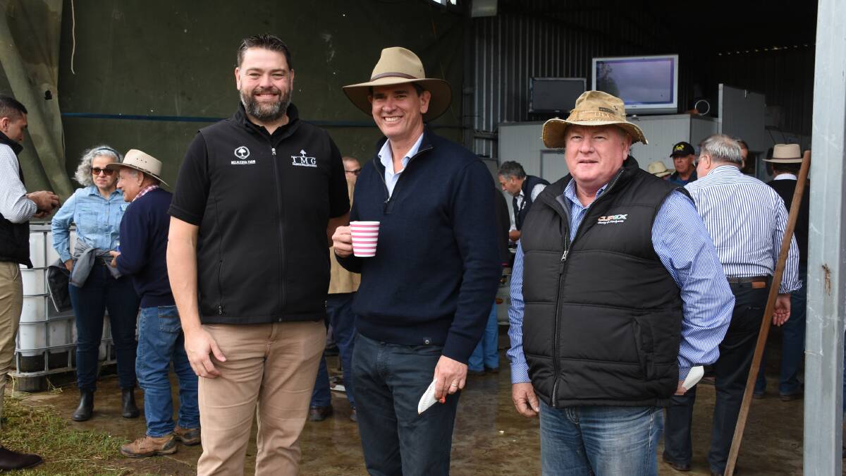 Tillbrook Melaleuka Group managing director John Dawkins (left), discussed the Akaushi breed during a break in the field day with AWN livestock and property general manager Peter Weaver and Clipex representative David Helfer.