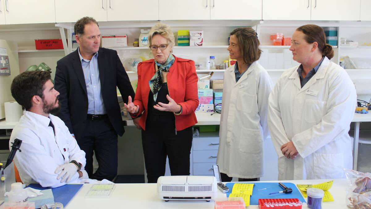 Department of Primary Industries and Regional Development (DPIRD) director general Ralph Addis (second from left) and Agriculture and Food and Regional Development Minister Alannah MacTiernan (centre) with DPIRD scientific staff early this year when Ms MacTiernan announced their 50-year-old research and biosecurity laboratories will be upgraded.