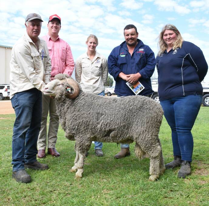 The Nairnup stud, Munglinup, sold the top-priced Merino ram in the sale when this ram sold for $4600 to the the Whiting family, BT Whiting & Co, Munglinup. With the ram were Nairnup stud principal Ross Gibson (left), Elders Hopetoun representative Nick Benson, Nairnups Zoe Gibson and buyers Damian Barton and Cassidy Whiting.