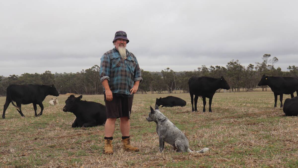 Paul Wyland with dog Occy and some of his cattle. He has been in Mt Barker for nine years and runs the operation alongside his wife Michelle.