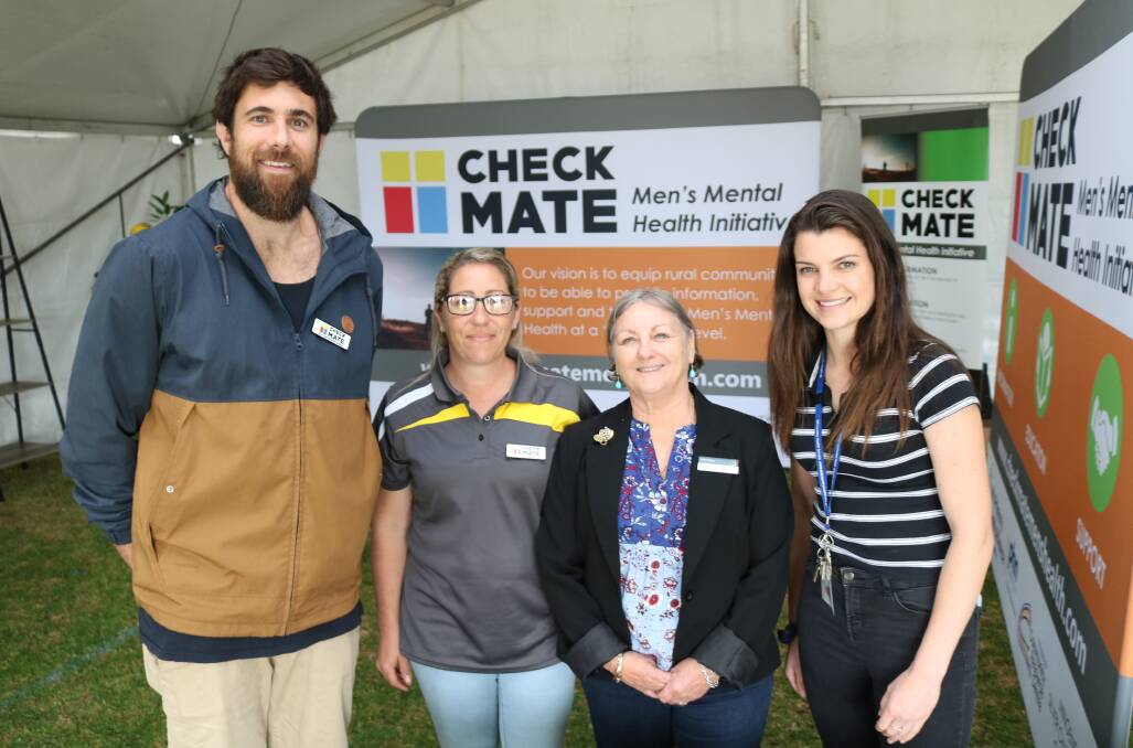  West Coast Eagles goal kicking goliath and Check Mate ambassador Josh Kennedy (left) spent time in the Check Mate Men's Mental Health Initiative stand at the McIntosh & Son Mingenew Midwest Expo with Mingenew Resource Centre co-ordinator Candice Lupton, WA Primary Health Alliance co-ordinator Jacki Ward, who is overseeing the suicide prevention trial for the Mid West and Elizabeth Lockyer, WA Country Health Services promotions co-ordinator. Having grown up in Northampton, Mr Kennedy said it was critical to have mental health support and services, not just in the city, but also available to people in rural areas. "Men are not very good at talking about their issues because it is seen as a sign of weakness, but we have to get rid of that sort of stigma," he said. "Men need to know there are networks in place they can go to and people they can talk to. Farmers, in particular, are often quite isolated and they come under a lot of stress and strain because they are dealing with things they can't control, like the weather. In my industry I can pretty much control everything I do, but they can't. Even if I have an injury, I can be in control of my rehab, but for farmers it is very different and they can often feel like they are letting their family down, which puts more strain on everyone." Check Mate provides information on what services are available in regional towns, education including workshops for men and training for key community members and support in the form of regular sundowners.