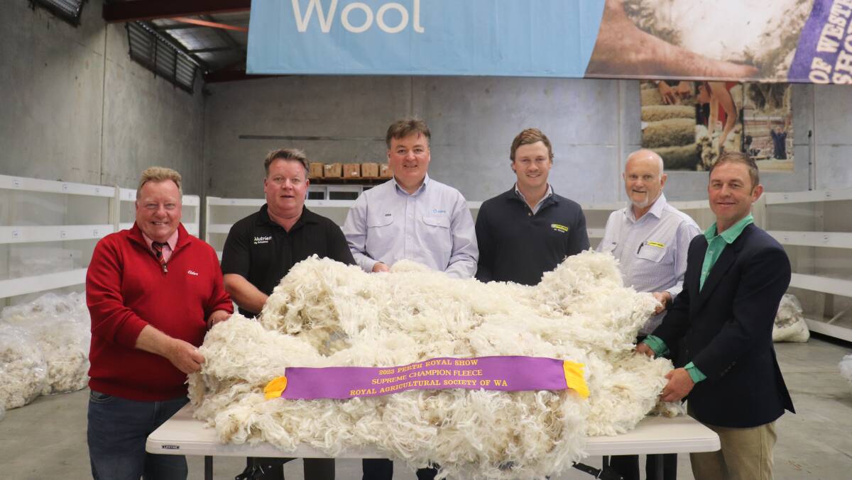 With the supreme champion fleece of the 2023 Perth Royal Show, exhibited by the King familys Rangeview stud, Darkan, were Elders wool sales manager Tim Burgess (left), Nutrien Ag Solutions account manager Cameron Henry, AWN wool specialist Tony Collins, Dyson Jones sheep and wool specialist Sam Howie, Dyson Jones wool marketer Tim Chapman and Nutrien Ag Solutions South West wool and stock agent Matt Chambers.
