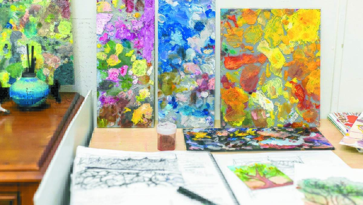 Ms Helmot's studio. Even her paint palettes are works of art in their own right. Photo: Nic Duncan.