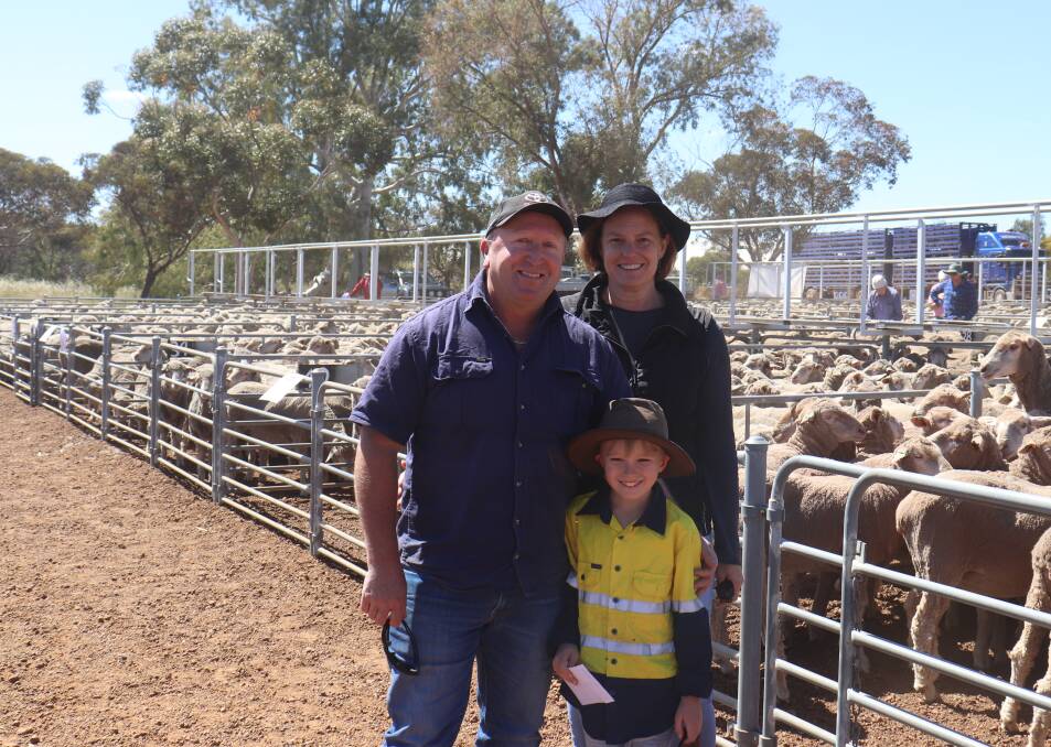 Brad, Leanne and Harrison Cluett, Porongurup looking at the ewes on offer prior to the Elders cicuit sale at Corrigin last week.