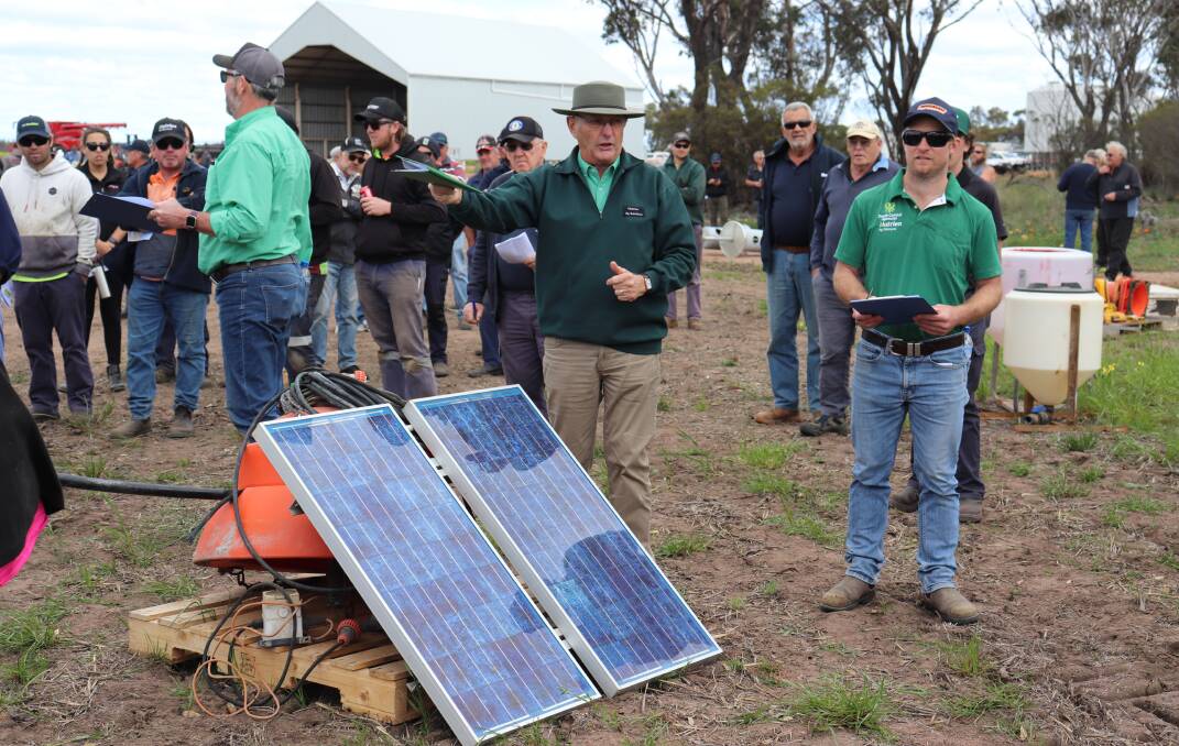 The Nutrien Ag Solutions team in action during the West River on farm clearing sale last week, where this mono solar pump and dam float sold for $1100.