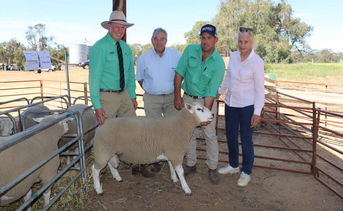 Nutrien Livestock, Wongan Hills auctioneer Grant Lupton (left), Te Rakau Texels stud co-principal Rob Wood, Nutrien Livestock's Leno Vigolo, holding one of two $1800 top-priced rams that will be heading east and stud co-principal Maria Wood.