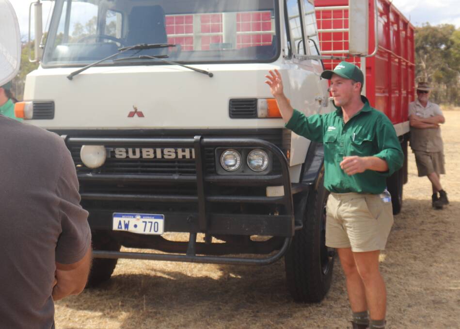 Landmark auctioneer James Culleton during the sale of a Mitsubishi FM 125 truck with bin, which reached the sale's top of $20,000.