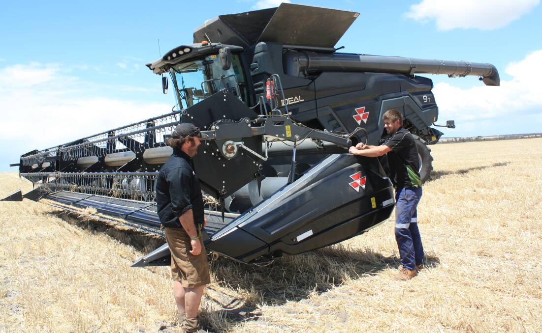 Independent consultant Ben Slater (left) chats with header driver Johannes Raamat, York, before the AGCO IDEAL header is taken out for a demonstration run on a south Ongerup farm.