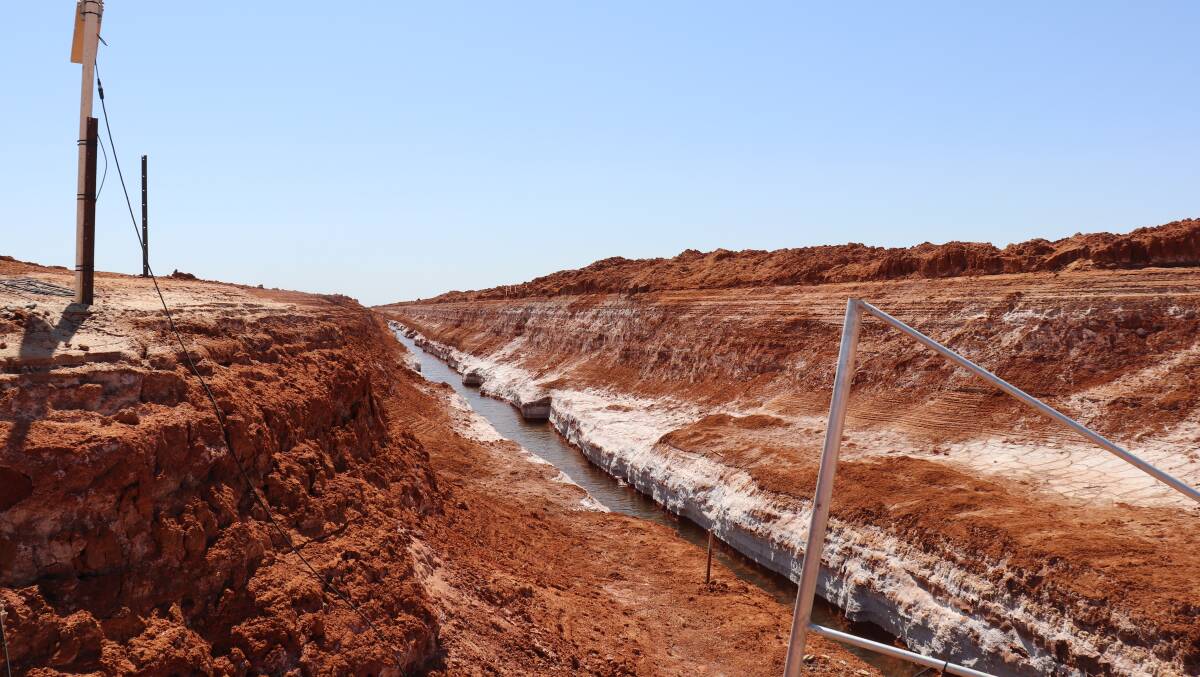 One of the brine collection trenches dug across Lake Way, a salt lake near Wiluna. Brine levels in more than 60 kilometres of trenches and 450 hectares of salt lakes are remotely monitored, as well as the mobile pumps moving brine from trench sumps into evaporation ponds.