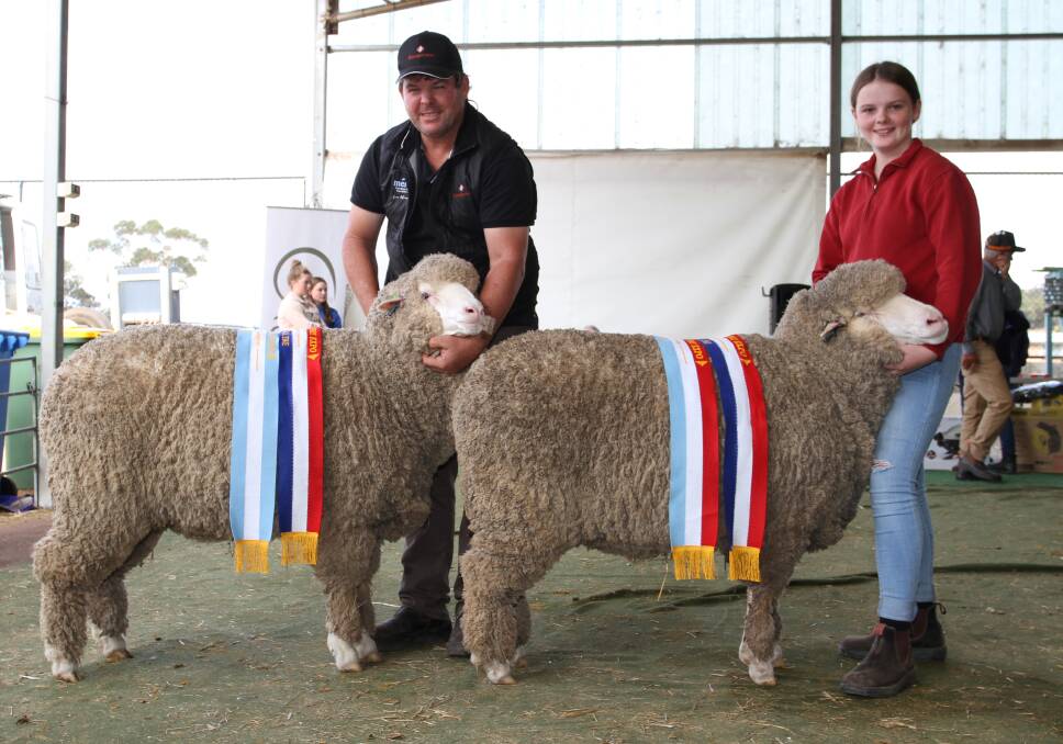  With the grand champion and champion fine wool Merino ewe and reserve grand champion and champion fine-medium wool champion Merino ewe exhibited by the Rangeview stud, Darkan, were stud principal Jeremy King and daughter Gemma. The grand champion ewe was also sashed the champion ewe of the show.