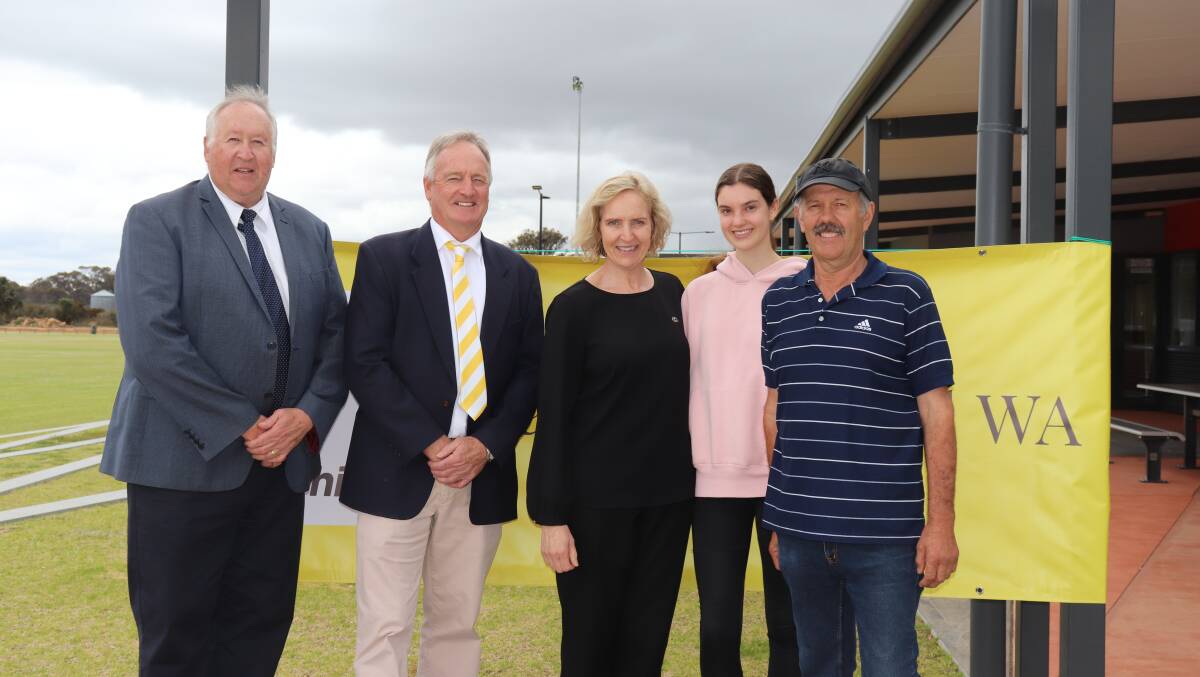 Ray White Rural WA auctioneer Hugh Ness (left) and rural sales representative Mike Batchelor with vendors Louise, Isabella, 17 and Tony Cristinelli after their 866 hectare property, Kylie, Tambellup sold at auction for $3.72 million.