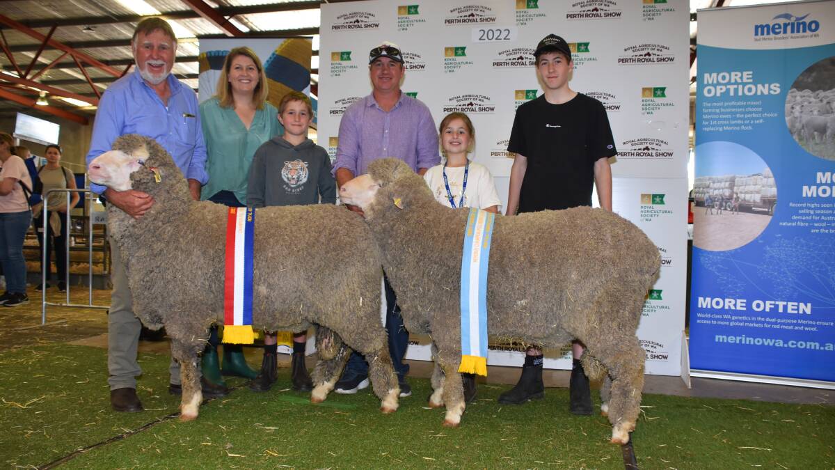 With the champion and reserve champion autumn shorn Poll Merino rams under 1.5 years exhibited by the Eastville Park stud, Wickepin, were Eastville Parks Rob (left), Elise, Hugh, Grantly, Isla and Will Mullan.