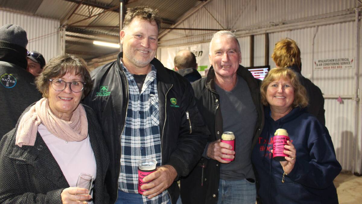 Fay Chatfield (left), Dawesville, Donald Thomson, Brian Fowler and Charmaine Thomson, Tammin, caught up at the eighth annual Pink Shearing For Liz Day at Yorkrakine last Saturday where another record total of more than $70,000 was raised for the Breast Cancer Research Centre WA.