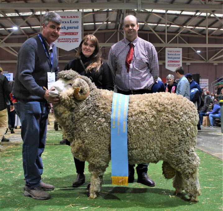 With the supreme exhibit and grand champion ram of show from the Cox familys Langdene stud, Dunedoo, New South Wales, were Langdene stud principals Garry (left) and Kel Cox, alongside fine wool judge Kip Gray, Stockman stud, Melton-Mowbray, Tasmania. The ram was also sashed the grand champion fine wool ram, champion fine wool Merino ram and champion August shorn fine wool Merino ram.