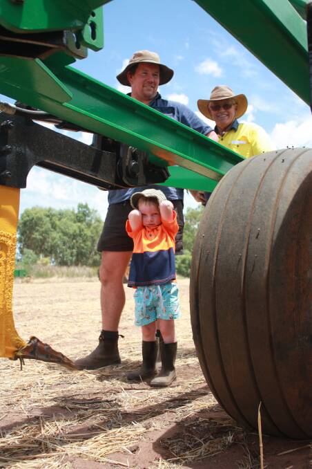 Geoff Cosgrove (left), Mingenew and his son Hamish, with Bernie Soullier, Yandanooka, survey this Gessner 13-tyne deep ripper which later sold for $40,000.