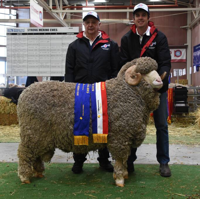With the grand champion strong wool ram of the show from the Kolindale stud, Dudinin, were former Kolindale stud owner Colin Lewis (left) and Kolindale co-principal Luke Ledwith. The ram was also sashed the champion strong wool Merino ram and champion August shorn strong wool Merino ram.